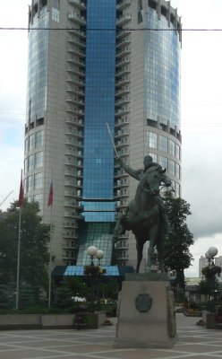 Old Statue of Russian General in Front of New Apartment Building