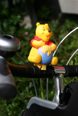 Pooh Bear on the handlebars