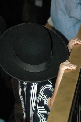 A Little Boy In A Hat