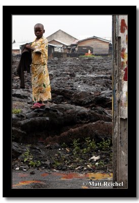 Girl in Yellow on the Lava Flow, Goma, Democratic Republic of Congo