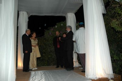 The parents under the Huppa before the wedding ceremony