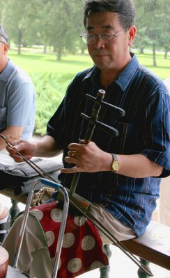 Man-Playing-Traditional-Ins.jpg