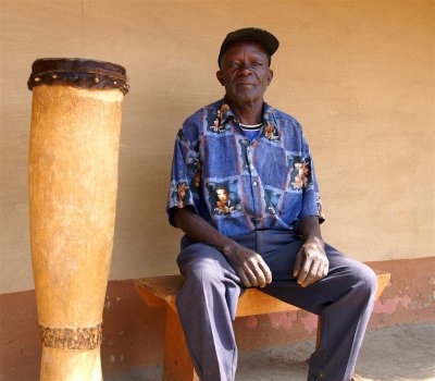 Mr Kumwenda with drum 3 Large.jpg