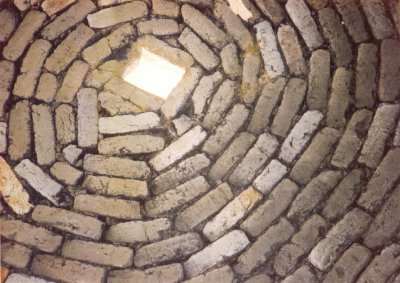 Looking up in an old oven.