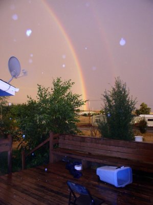 Rainbow in a thunder storm (with rain spots)
