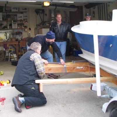 Boat now fully supported by trailer; cradle removed.