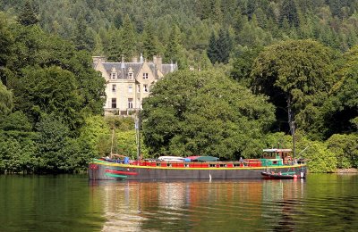 Glengarry Castle Hotel and barge, Caledonian Canal