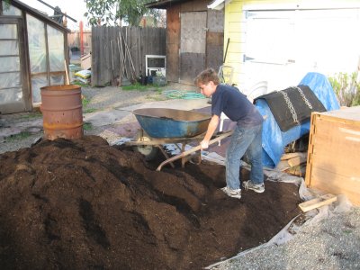 Jacob shoveling compost