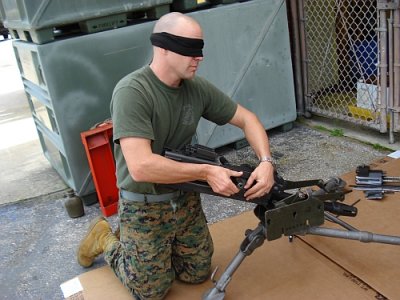 Blindfolded diss/ass of the MK19 automatic grenade launcher