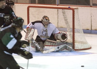 Drew Roeder eyes the puck.jpg