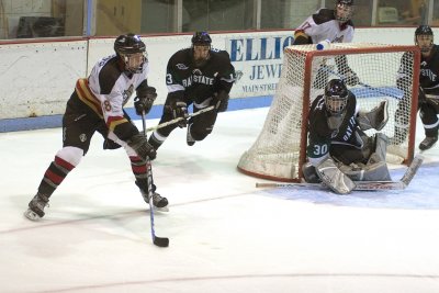 Nehring looks to give the puck a new home.jpg