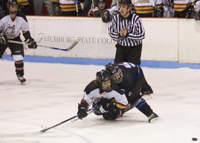 Nevins wrapped up with the ref praying.jpg