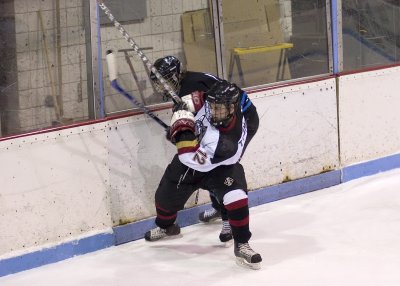 Toomey Battles behind the net.jpg