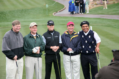 Pro Zach Johnson and Honeywell's Bob Gillette and comedian George Lopez