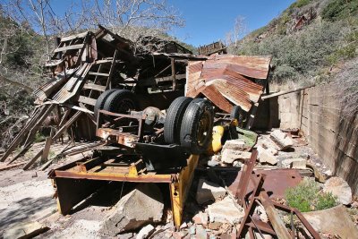 Overturned Truck with Ruins in Background