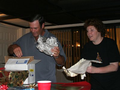 Patti anxiously waits for Carl to deliver the gift