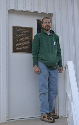 Tom at door--the scope was renamed in 1999 to honor Gerard Kuiper, founder of the LPL