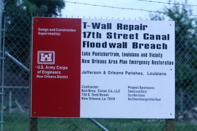 Sign in front to Repaired Wall
