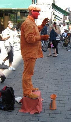 The Performance of an Orange Man on Aleksanterinkatu, Helsinki