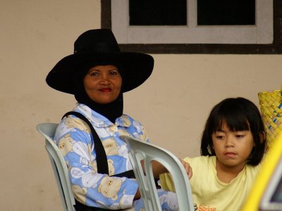 Lady In Hat - Wow That Will Keep The Rain Off