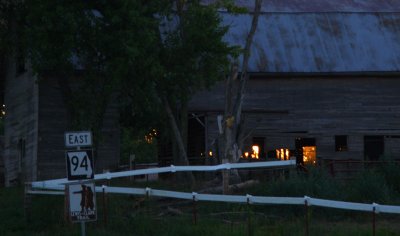 Sunrise through old barn