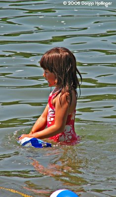 Little girl in Walden Pond