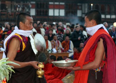 Two Monks performing the ritual ablutions