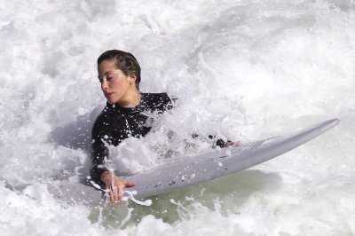 Breaking through wave