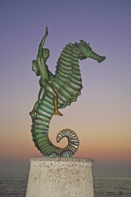 PV's history. Seahorse = by the ocean, young boy = young city, sombero = Spanish roots.