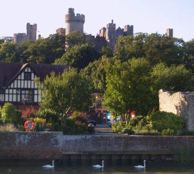 Arundel;three swans all in a row.