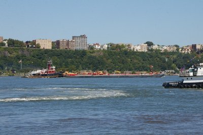 Loaded fuel barge head up the Hudson