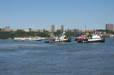 parade of tugs heads north