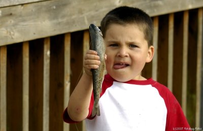 His daddy caught a fish!