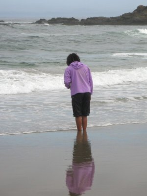 She's Letting Her Feet be Buried in the Sand