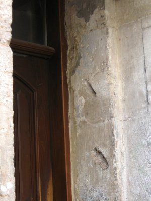 ...their mezuzah marks visible in the door frames