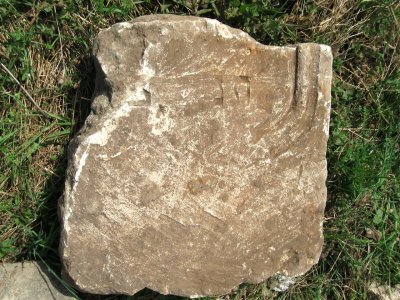 ...the second of the three stones reveals some lettering
