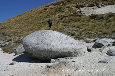 Granite rocks - Roy continues through the tussocks