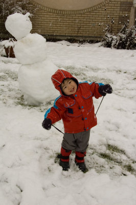 Posing with Snowman