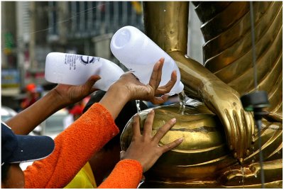 Cleansing the Buddha image-Songkran