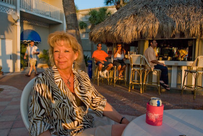 Kris relaxing with a beer watching the sunset at the Tiki Hut bar