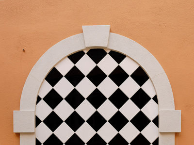 Arch with black and white tiles