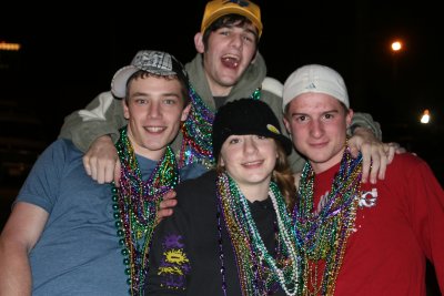 Frieder, Joel, Abby and Greg at the Mardi Gras Parade
