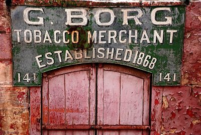 Aged shop signs from abroad: stories told in other languages, too