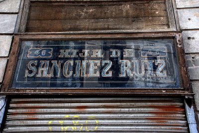 Aged shop signs from abroad: stories told in other languages, too