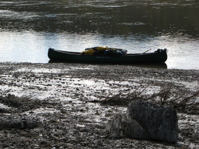 Mud and ice, scarred banks