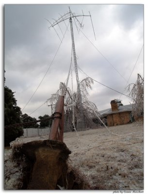 Guy wire pole pulled out by ice load