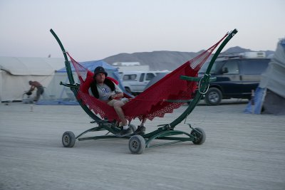 Two Guys in a hammock going by