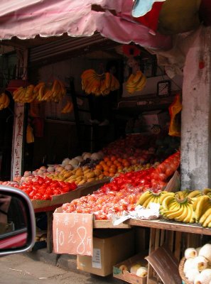 Fruit stall near fabric market, Dong Jia Du Lu