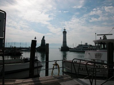  Lindau Harbour. The entrance is flanked by a lion monument and a lighthouse