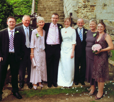 wedding party outside castle smaller second attempt corrected.jpg